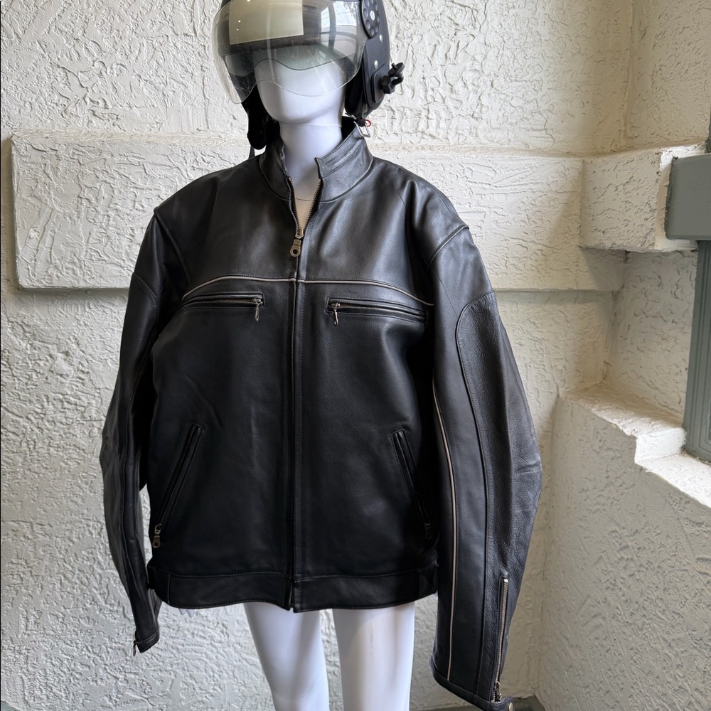 Black Motorcycle Jacket. Heavy leather. Very good condition, almost new.